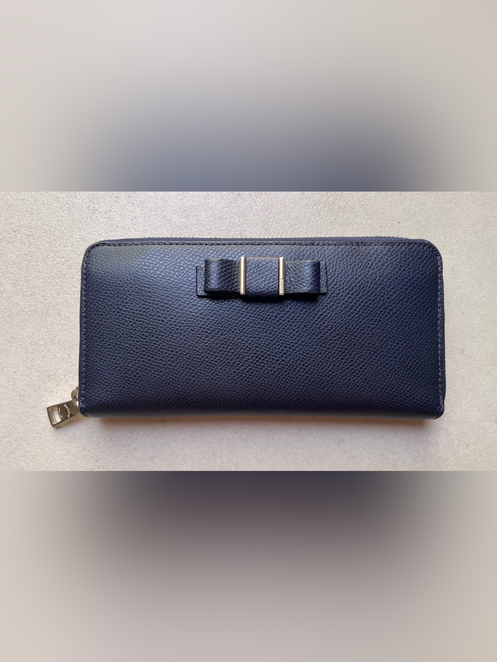 Coach “Darcy” Navy Leather Zip Wallet with Signature Bow Detail